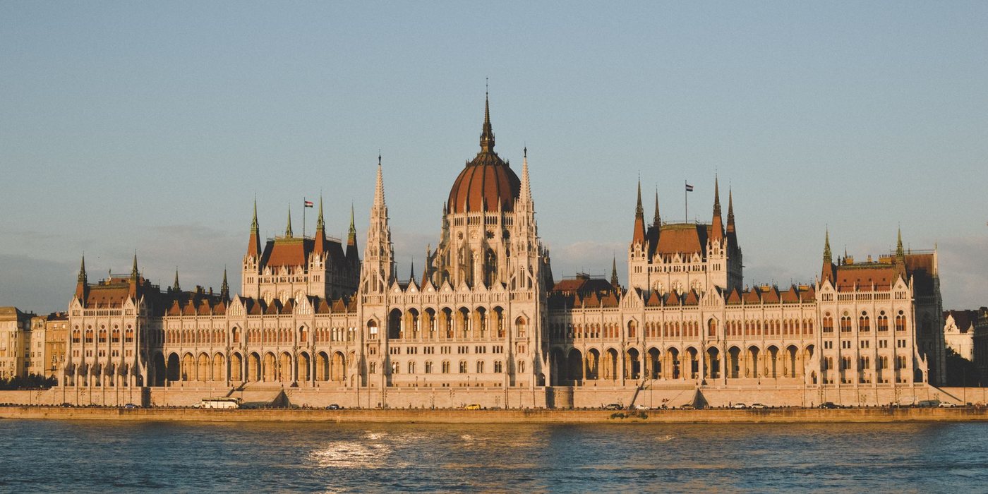 Budapest Parliament and the Danube at sunset